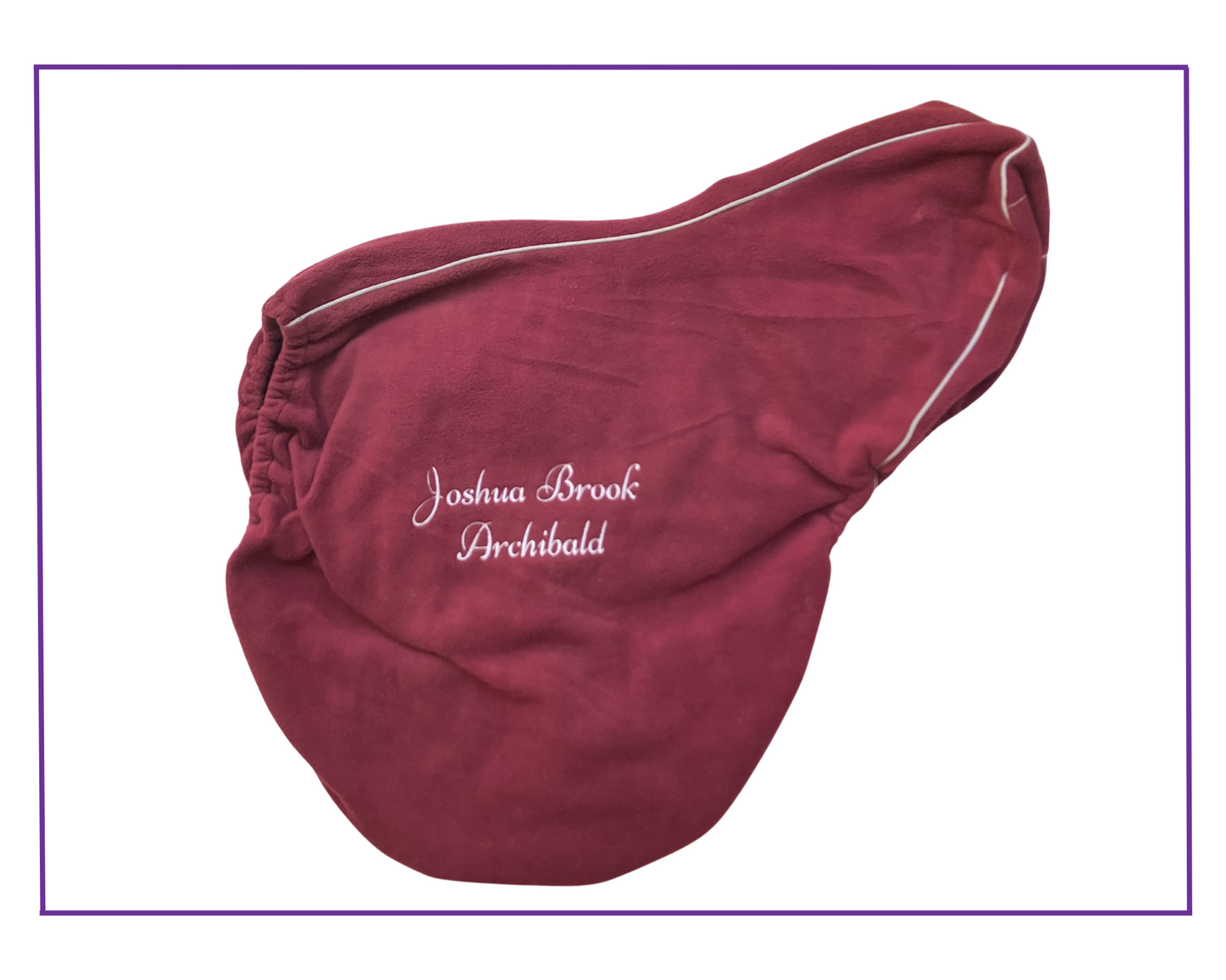 Fleece saddle cover with piping and horse name